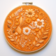 Embroidery Designs focused on Orange Colour Theme | Midjourney Prompt