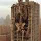 A 3D midjourney prompt of a Human skeleton abandoned around a building.